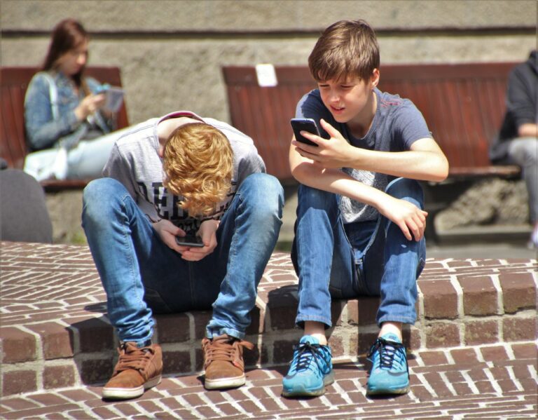 2 boys on cell phones When your child is already viewing porn: Sexpectations - a book of hope and help